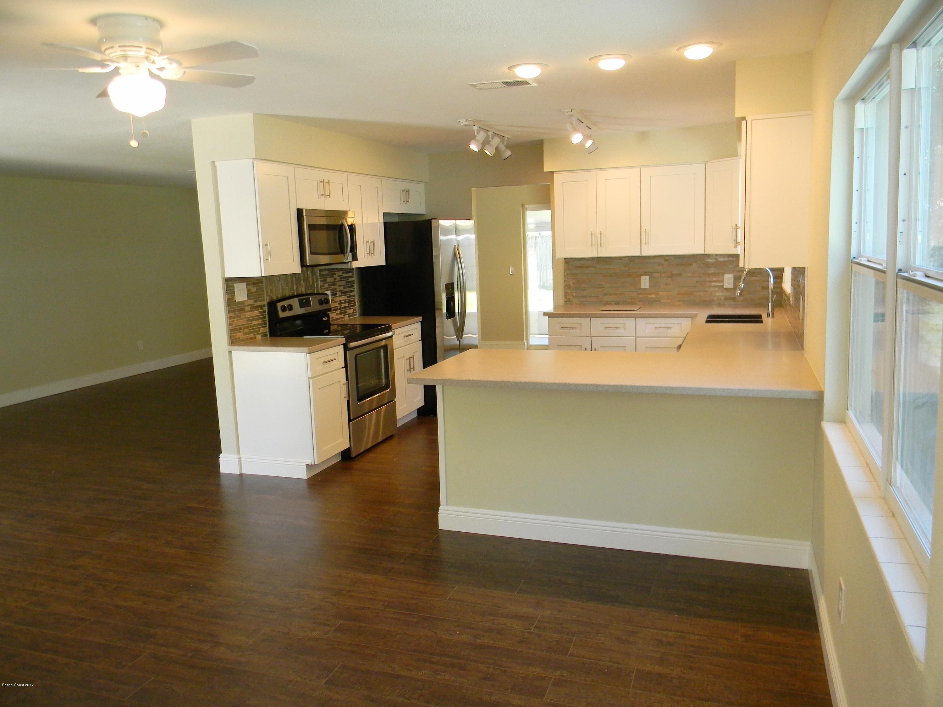1882 North Carpenter Road Titusville, FL 32796 - Photo 2 of 39 KITCHEN A