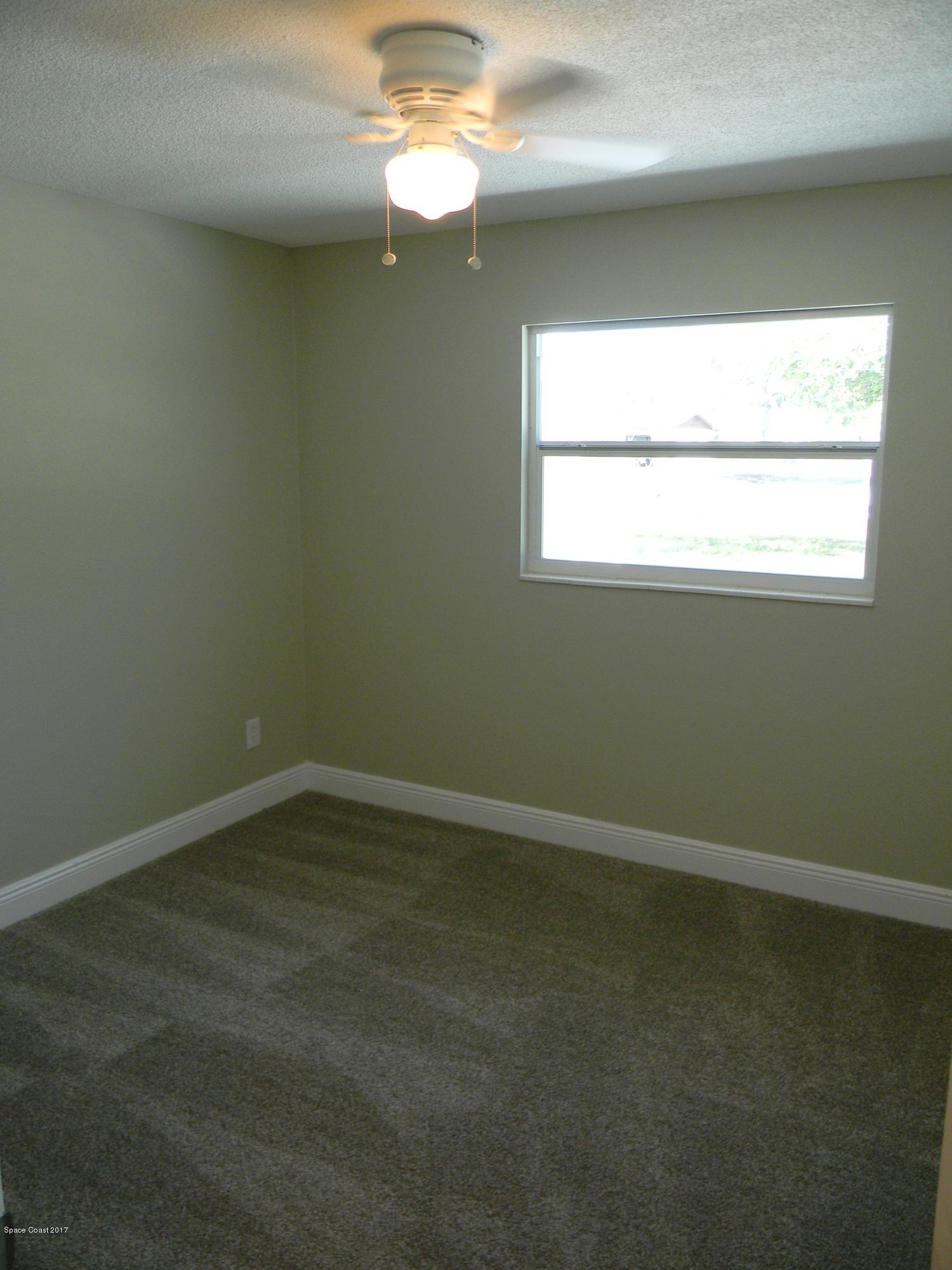 1882 North Carpenter Road Titusville, FL 32796 - Photo 14 of 39 BEDROOM 1