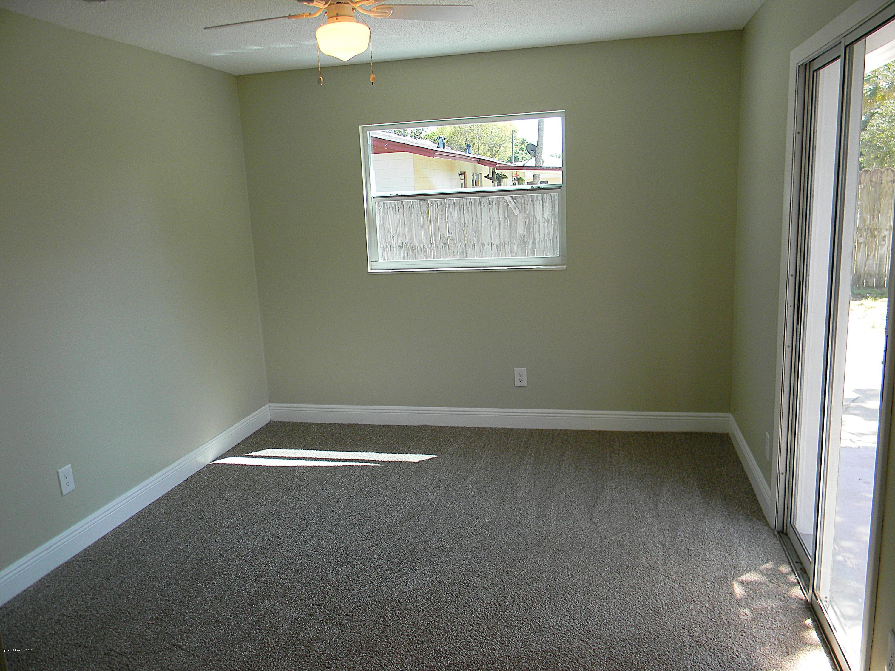 1882 North Carpenter Road Titusville, FL 32796 - Photo 19 of 39 MASTER BEDROOM