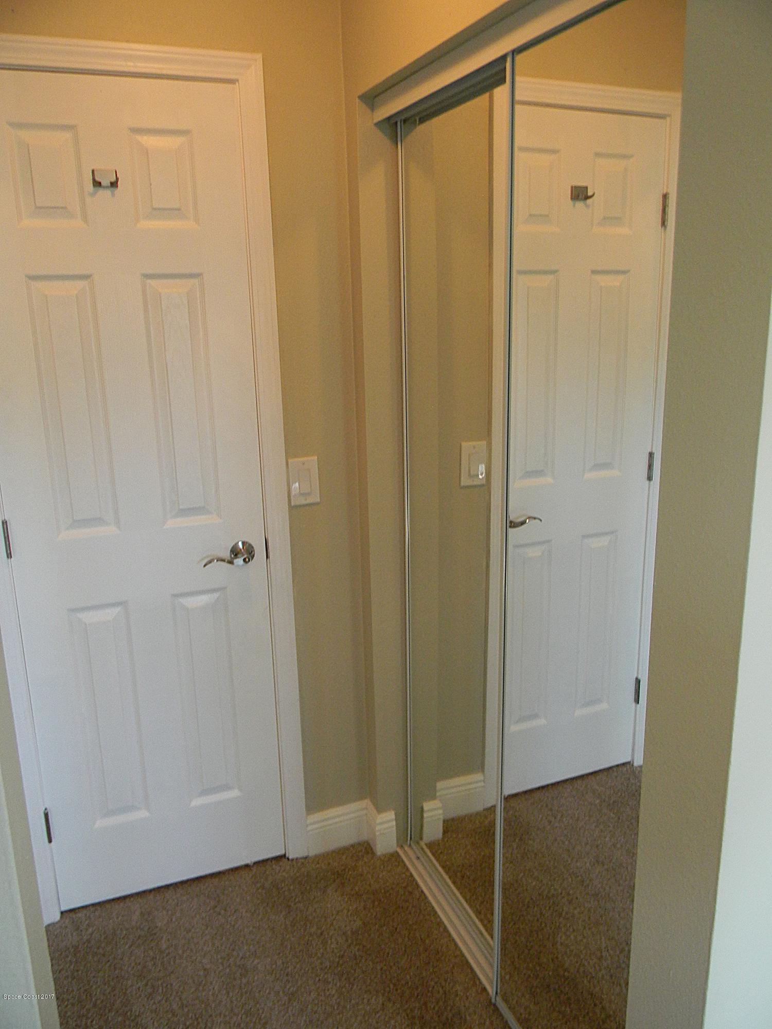 1882 North Carpenter Road Titusville, FL 32796 - Photo 20 of 39 MASTER BEDROOM CLOSET 1