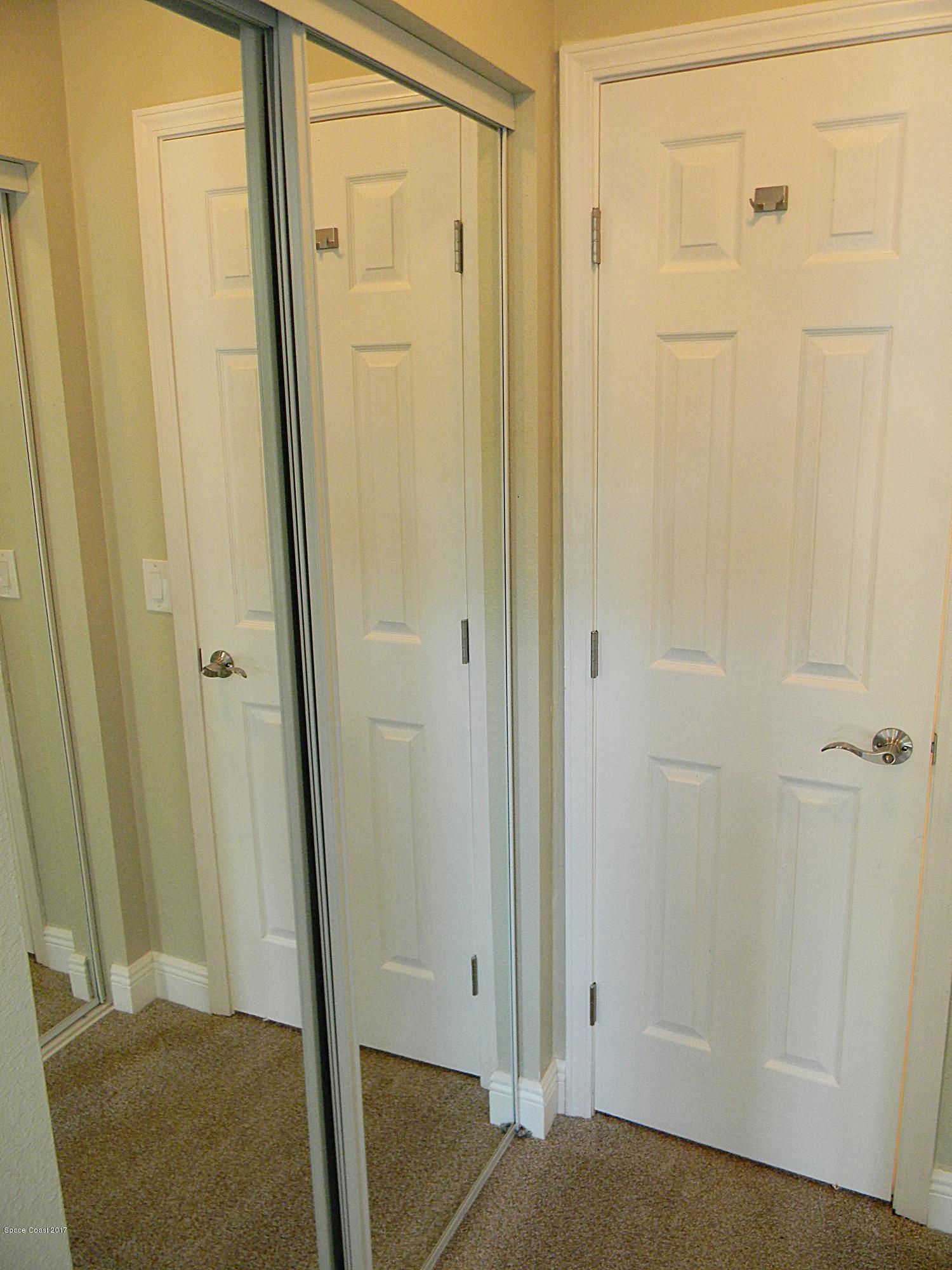1882 North Carpenter Road Titusville, FL 32796 - Photo 21 of 39 MASTER BEDROOM CLOSET 2