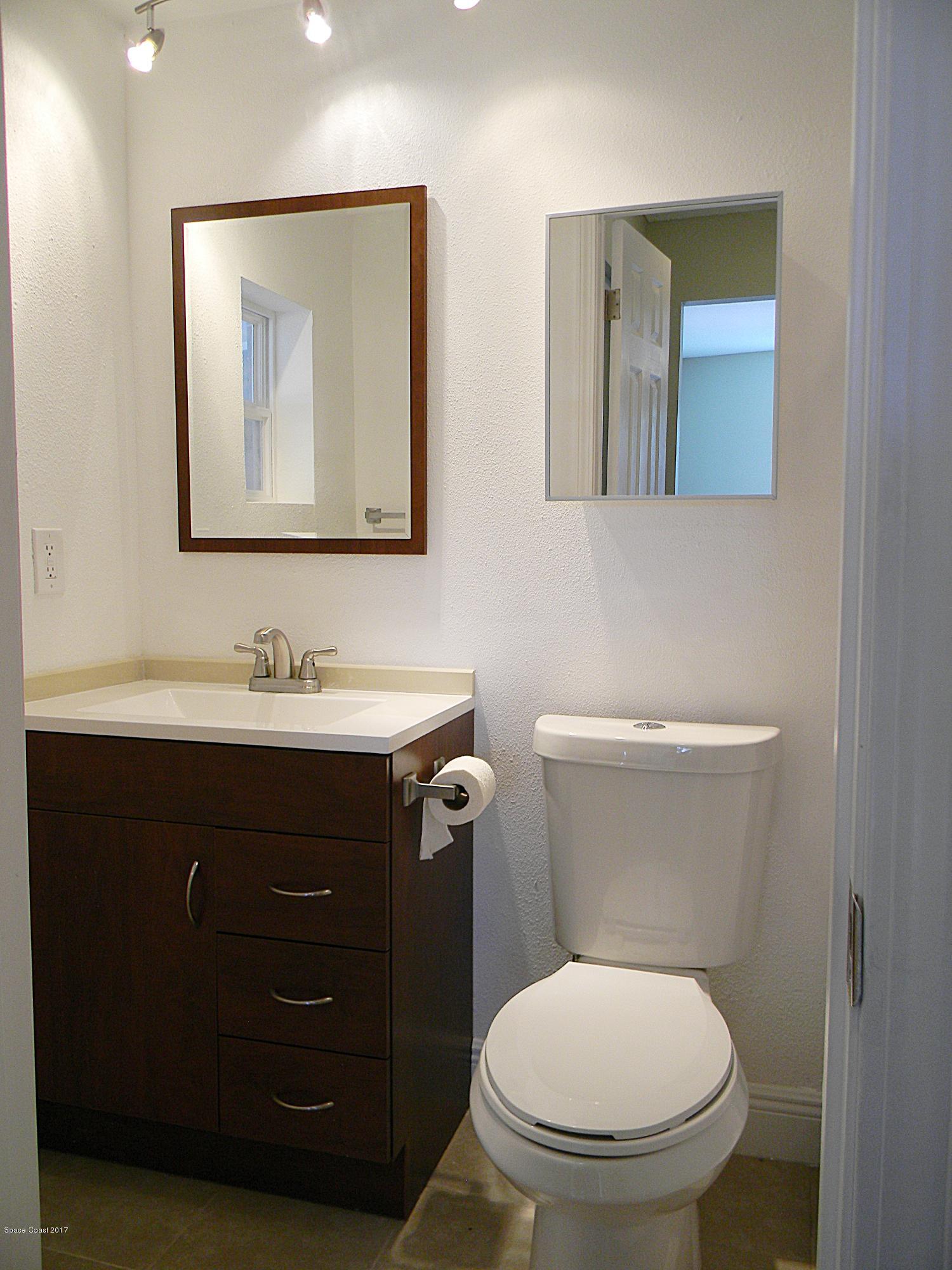 1882 North Carpenter Road Titusville, FL 32796 - Photo 22 of 39 MASTER BATHROOM 1 A