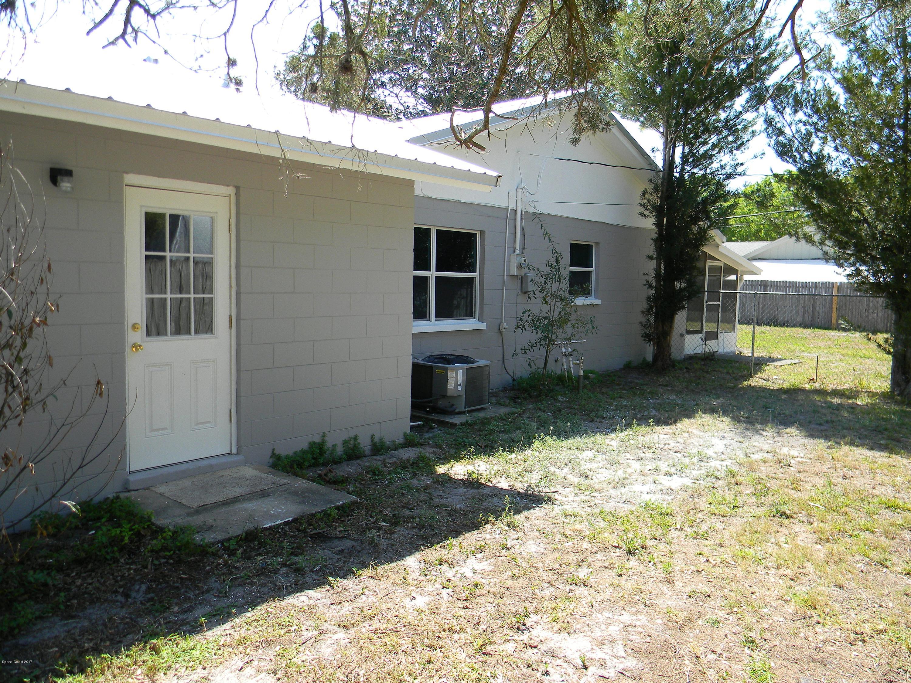 1882 North Carpenter Road Titusville, FL 32796 - Photo 25 of 39 NORTH SIDE OF HOME