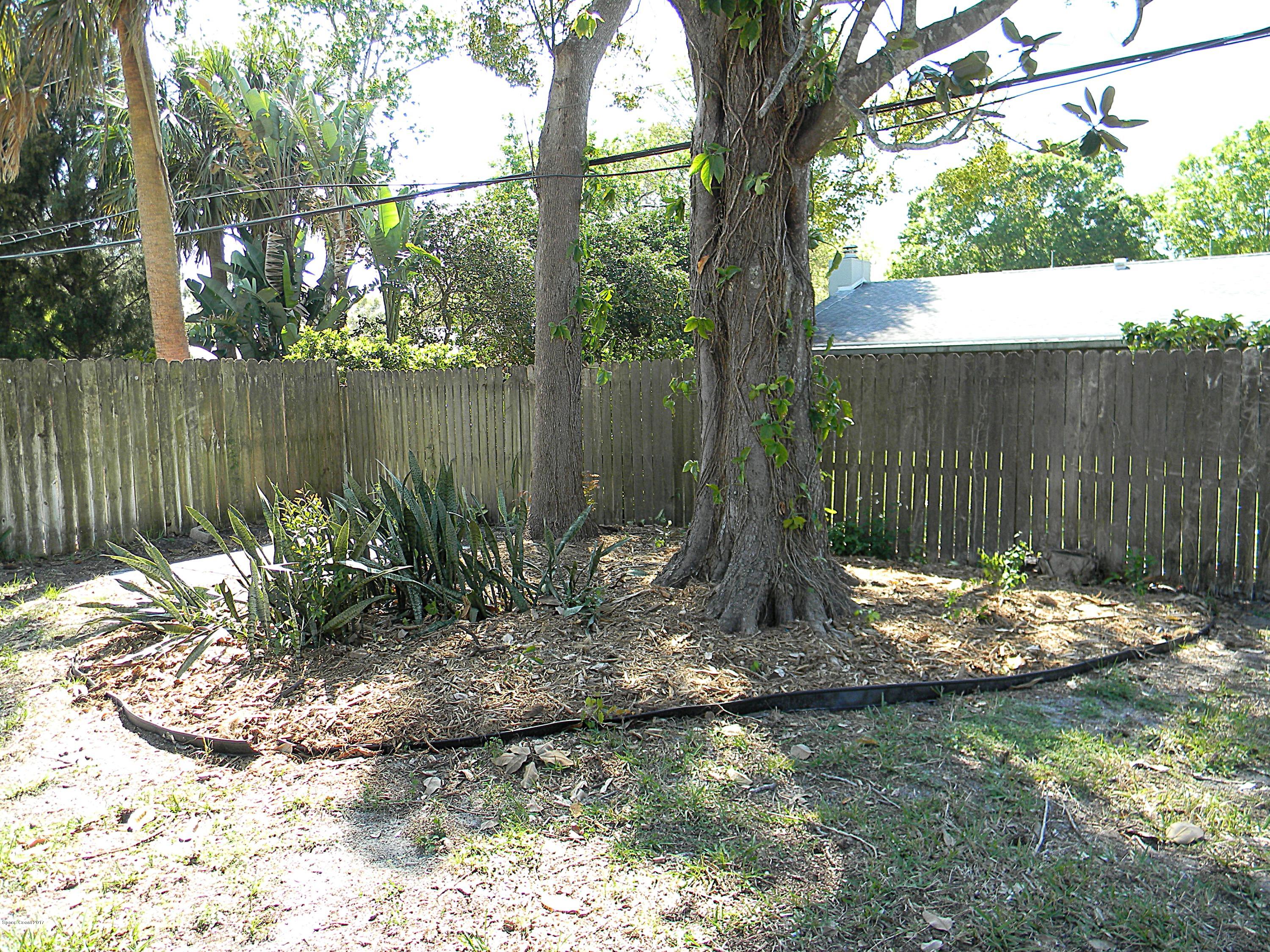 1882 North Carpenter Road Titusville, FL 32796 - Photo 35 of 39 BACK YARD LANDSCAPING