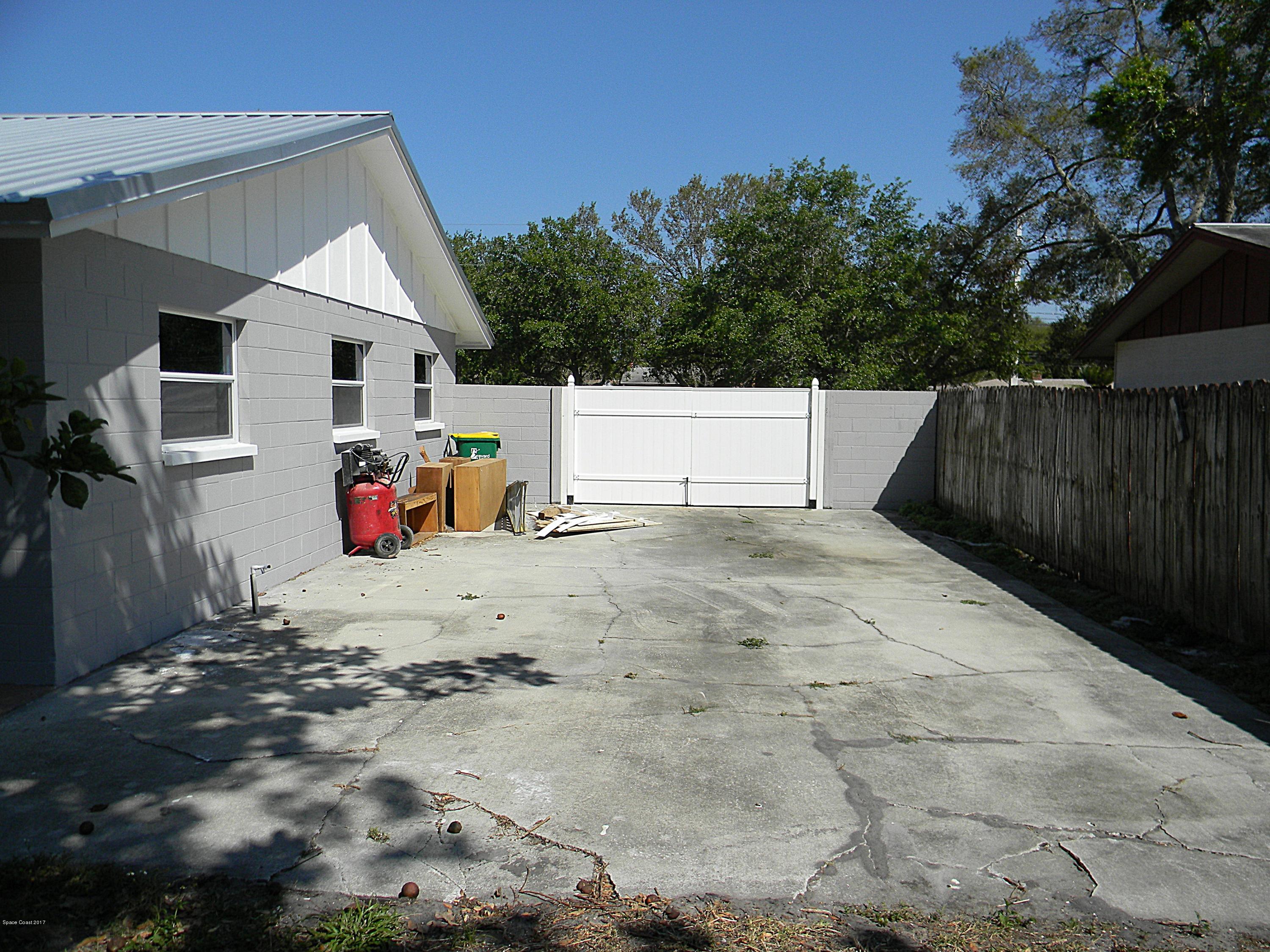 1882 North Carpenter Road Titusville, FL 32796 - Photo 37 of 39 SOUTHSIDE & LARGE PARKING AREA