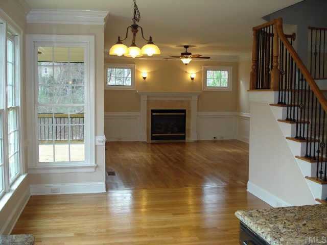 2106 Cook Ridge Court Raleigh, NC 27615 - Photo 4 of 11 a view of livingroom with hardwood floor and window