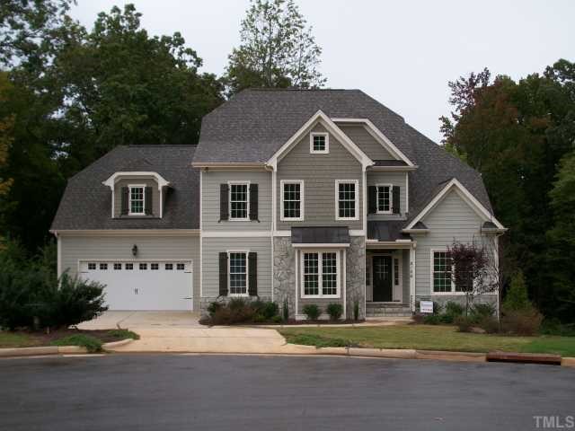 2106 Cook Ridge Court Raleigh, NC 27615 - Photo 5 of 11 a front view of a house with a yard