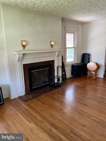 a bathroom with a sink a vanity and a large mirror