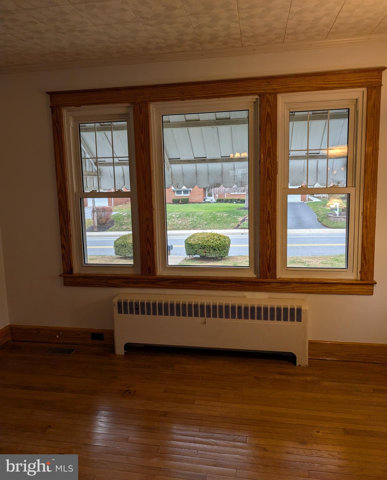 428 East Baltimore Street Taneytown, MD 21787 - Photo 21 of 55 a view of a room with wooden floor and windows