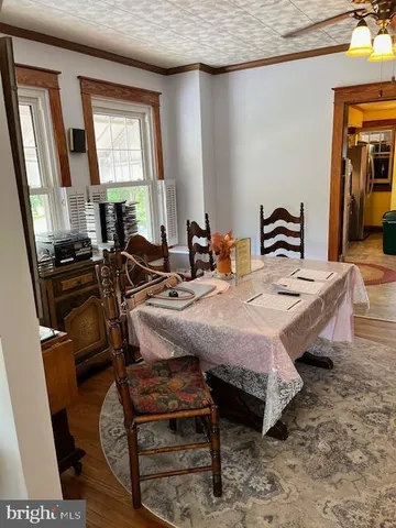 a bedroom with furniture and a rug