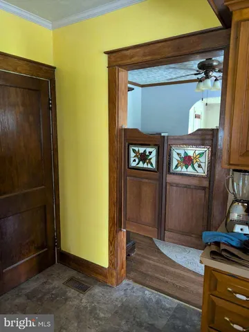 a bathroom with a glass shower door