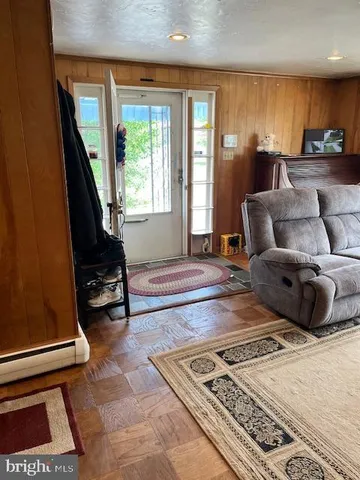 a view of an empty room and a windows