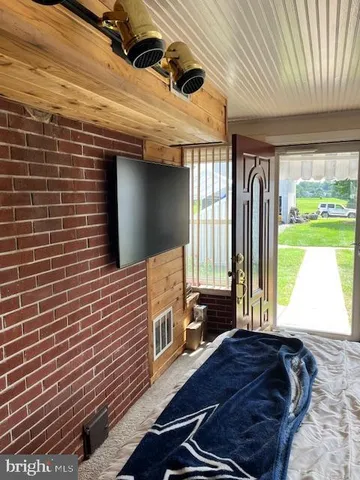 a room with furniture and a fireplace