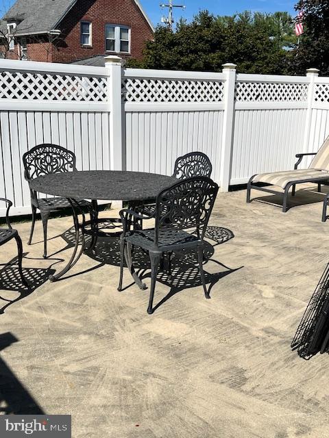 428 East Baltimore Street Taneytown, MD 21787 - Photo 50 of 55 Patio surrounded by vinyl fencing