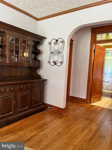 a bathroom with a sink a mirror and a shower