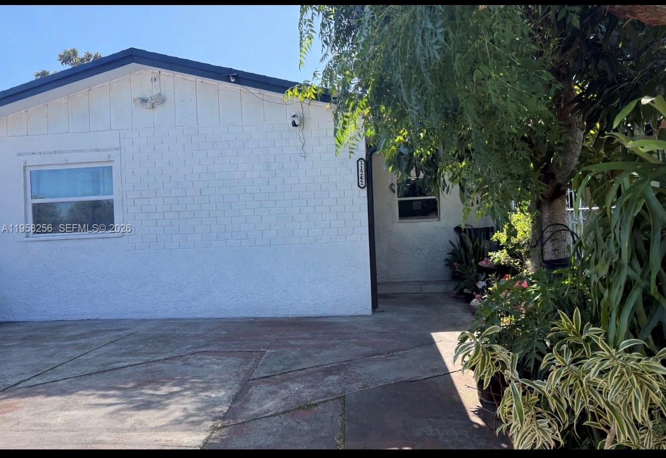 11242 Southwest 189th Lane Miami, FL 33157 - Photo 1 of 1 a view of a garage