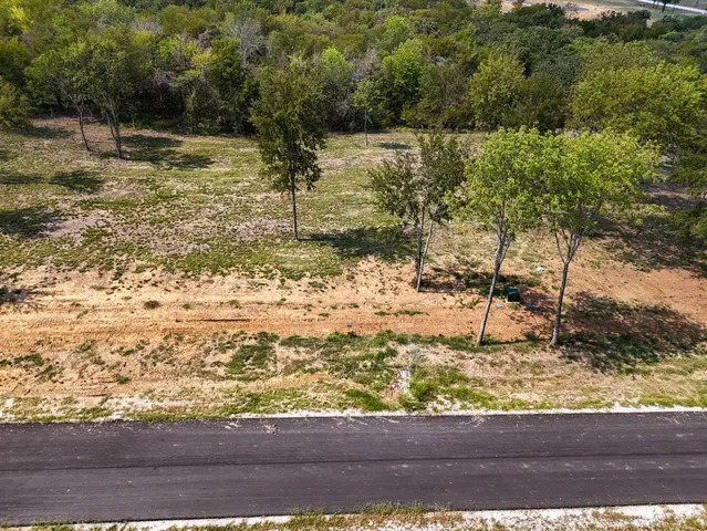 a view of a large body of water and a mountain view
