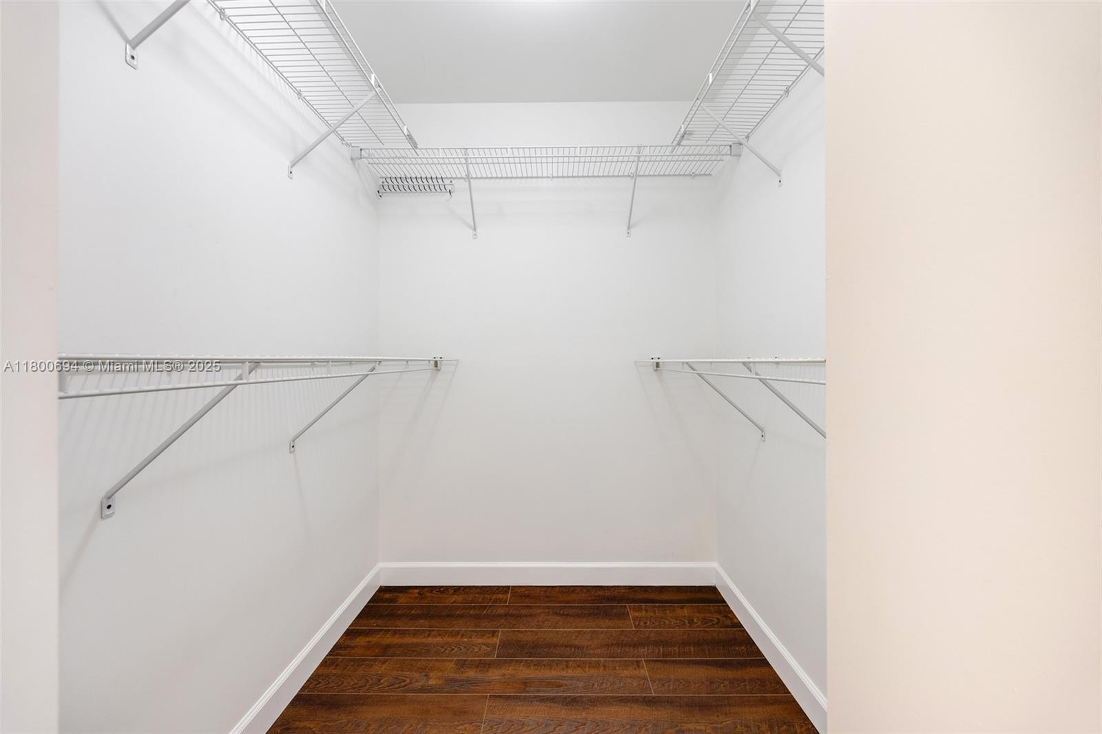 8395 Southwest 73rd Avenue, Unit 320 Miami, FL 33143 - Photo 15 of 18 a view of a room with racks on the wall