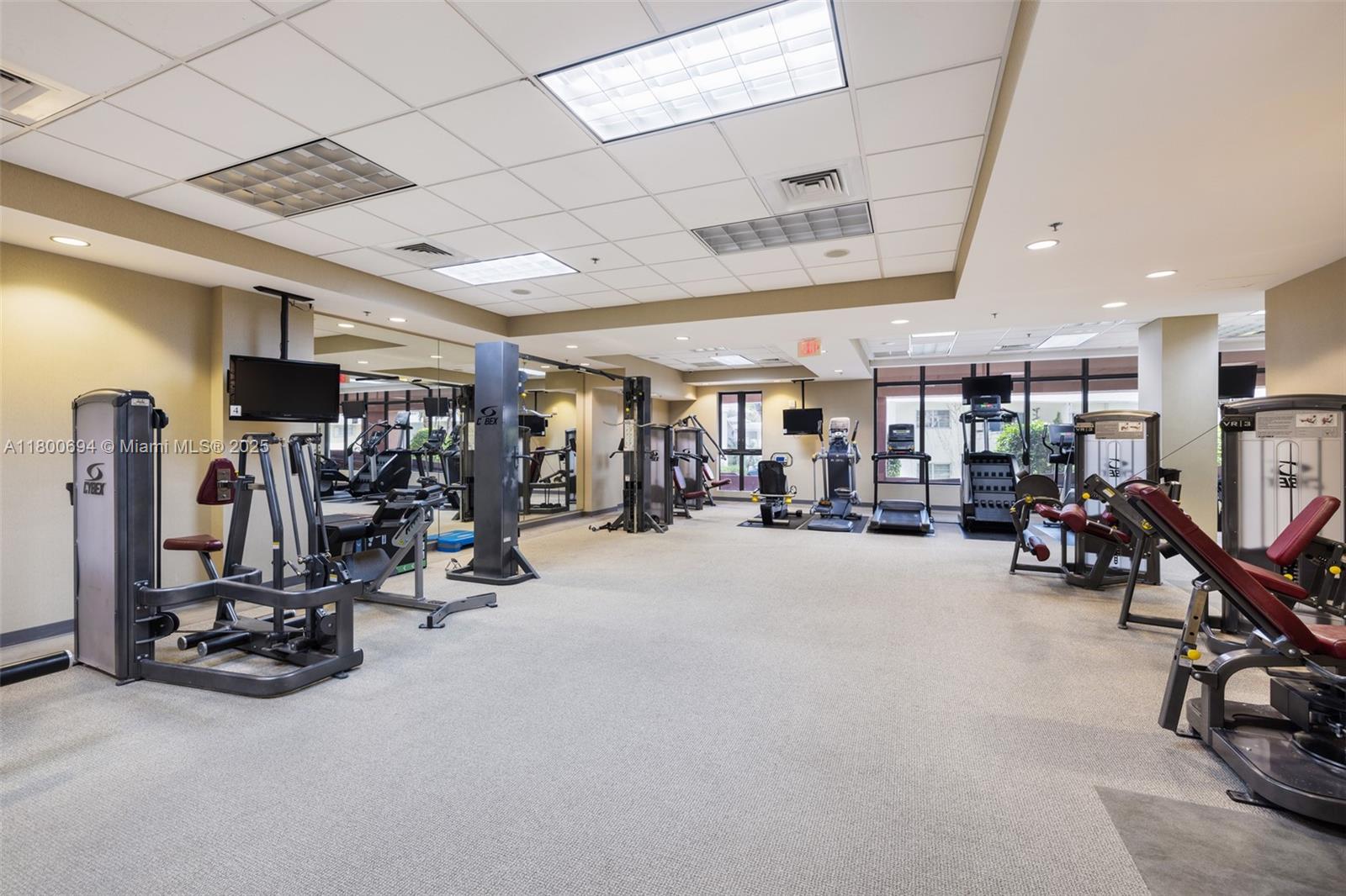 8395 Southwest 73rd Avenue, Unit 320 Miami, FL 33143 - Photo 16 of 18 a view of a room with gym equipment