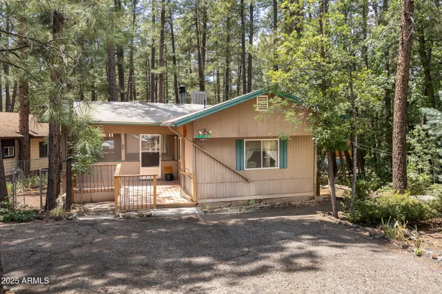 a house with trees in the background