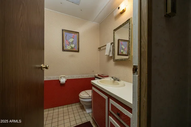 a bathroom with a sink and a toilet