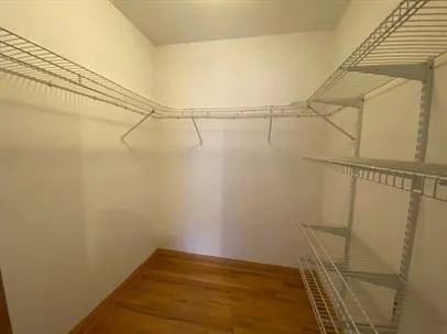 a view of a room with racks on the wall
