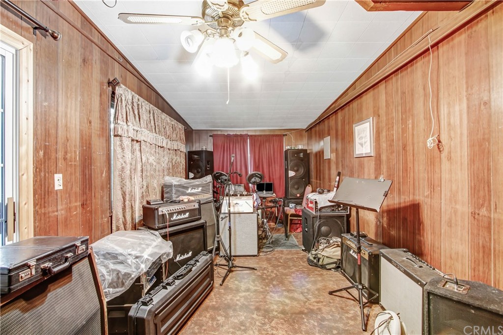 61495 La Jolla Drive Joshua Tree, CA 92252 - Photo 19 of 21 a view of a livingroom with furniture and a window