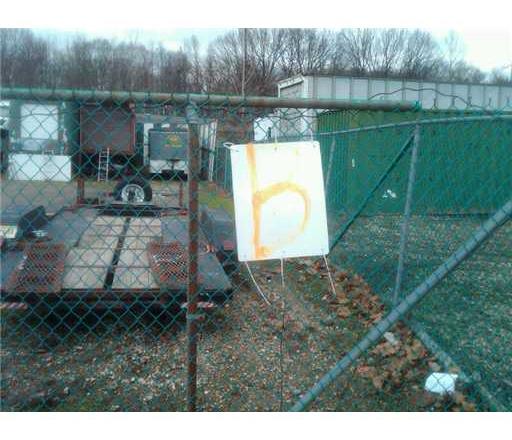 555 Old Water Works Road, Unit 8 Old Bridge, NJ 08857 - Photo 3 of 12 a backyard of a house with table and chairs