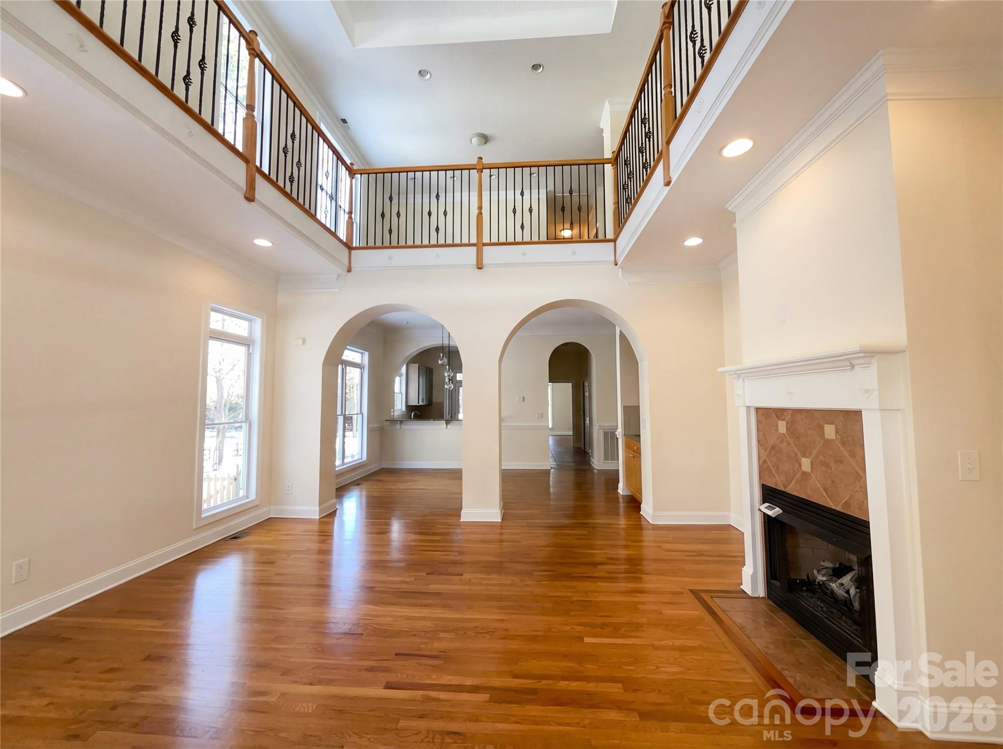 405 Isle Of Pines Road Mooresville, NC 28117 - Photo 3 of 18 a view of entryway and hall with wooden floor