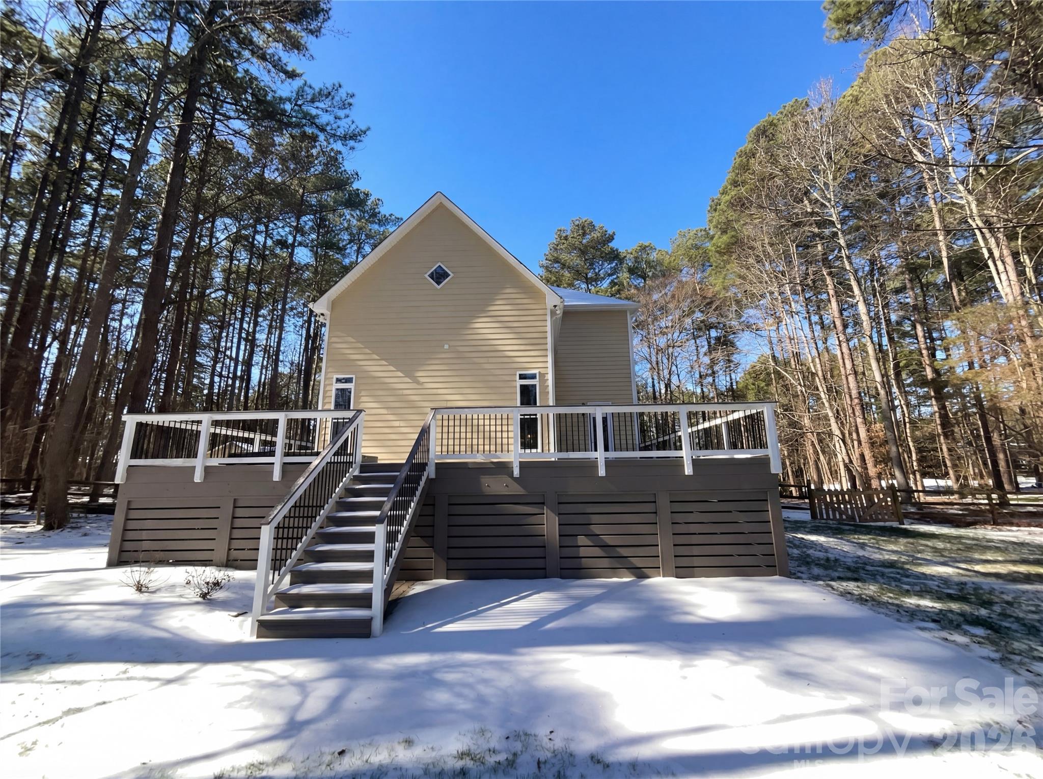 405 Isle Of Pines Road Mooresville, NC 28117 - Photo 5 of 18 a view of a house with a yard