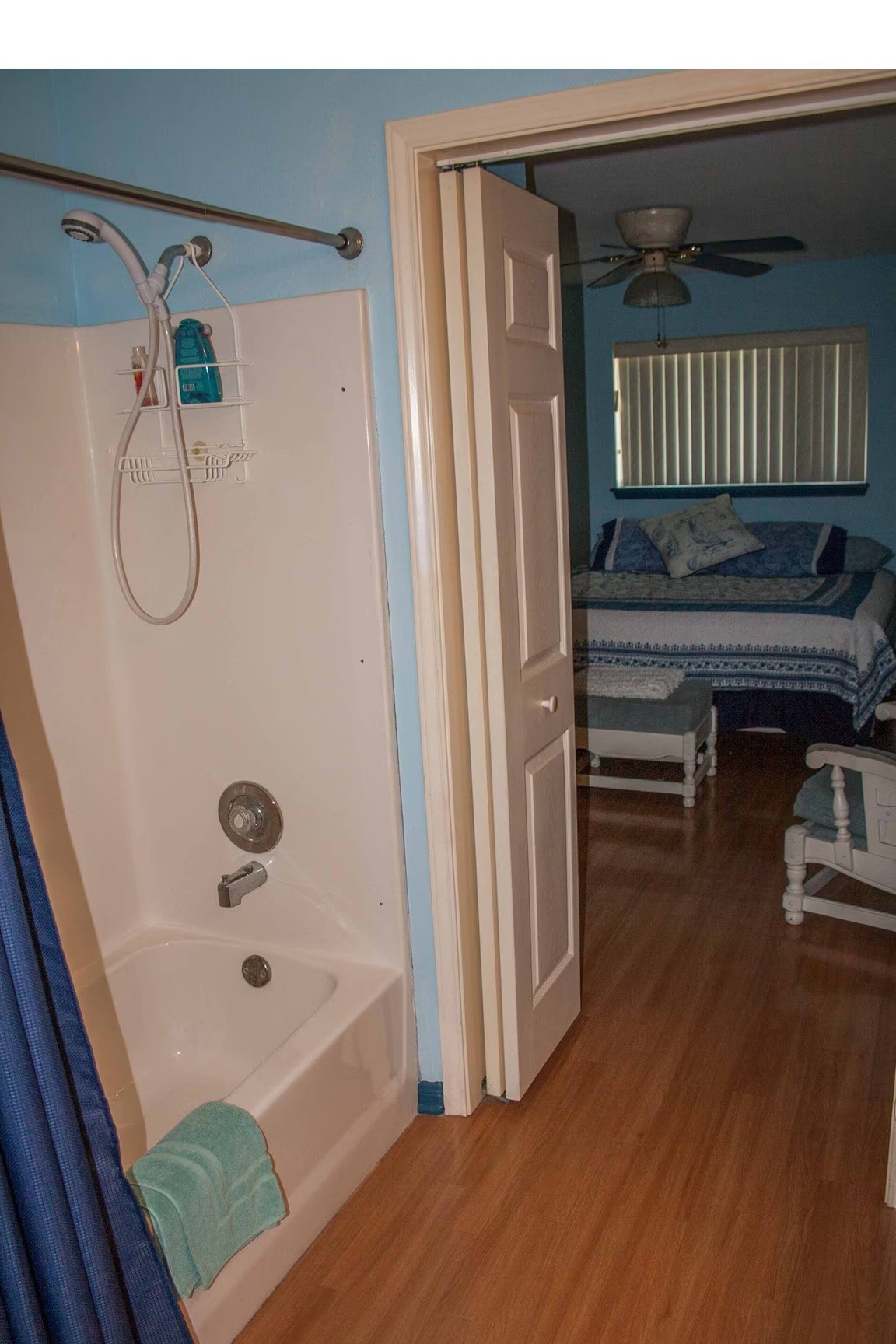 460 616th Sargent, TX 77414 - Photo 13 of 23 a bathroom with a bathtub and a shower