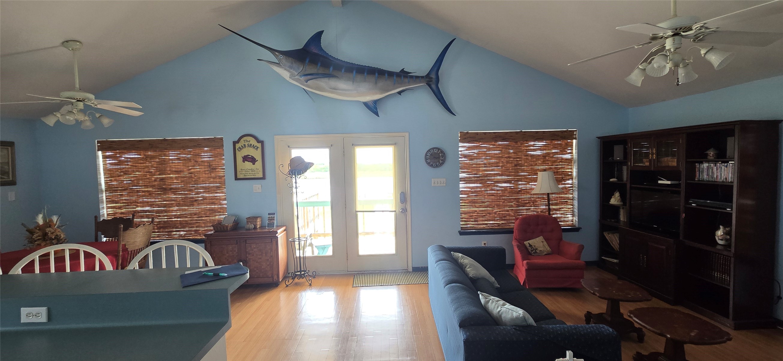460 616th Sargent, TX 77414 - Photo 6 of 23 a living room with furniture and a floor to ceiling window