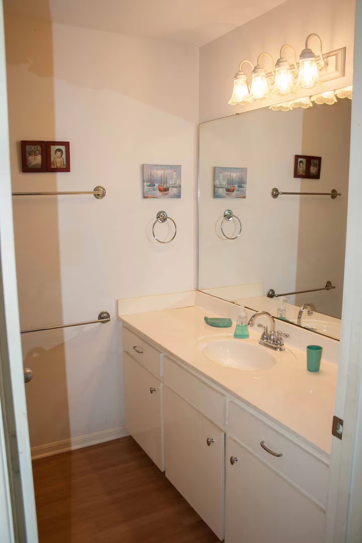 460 616th Sargent, TX 77414 - Photo 9 of 23 a bathroom with a sink and mirror