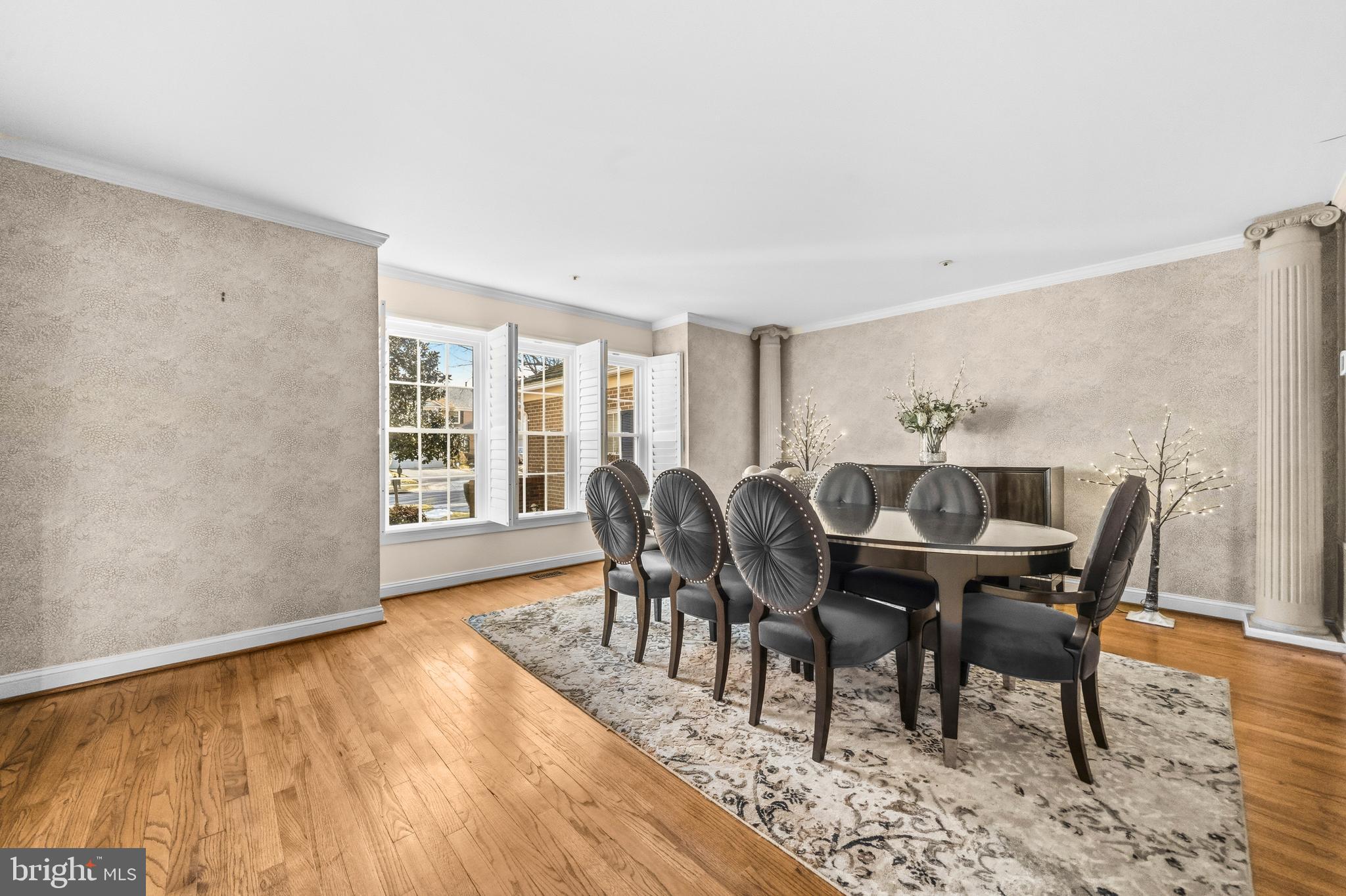 11806 Bishops Content Road Bowie, MD 20721 - Photo 13 of 49 a view of a dining room with furniture and wooden floor