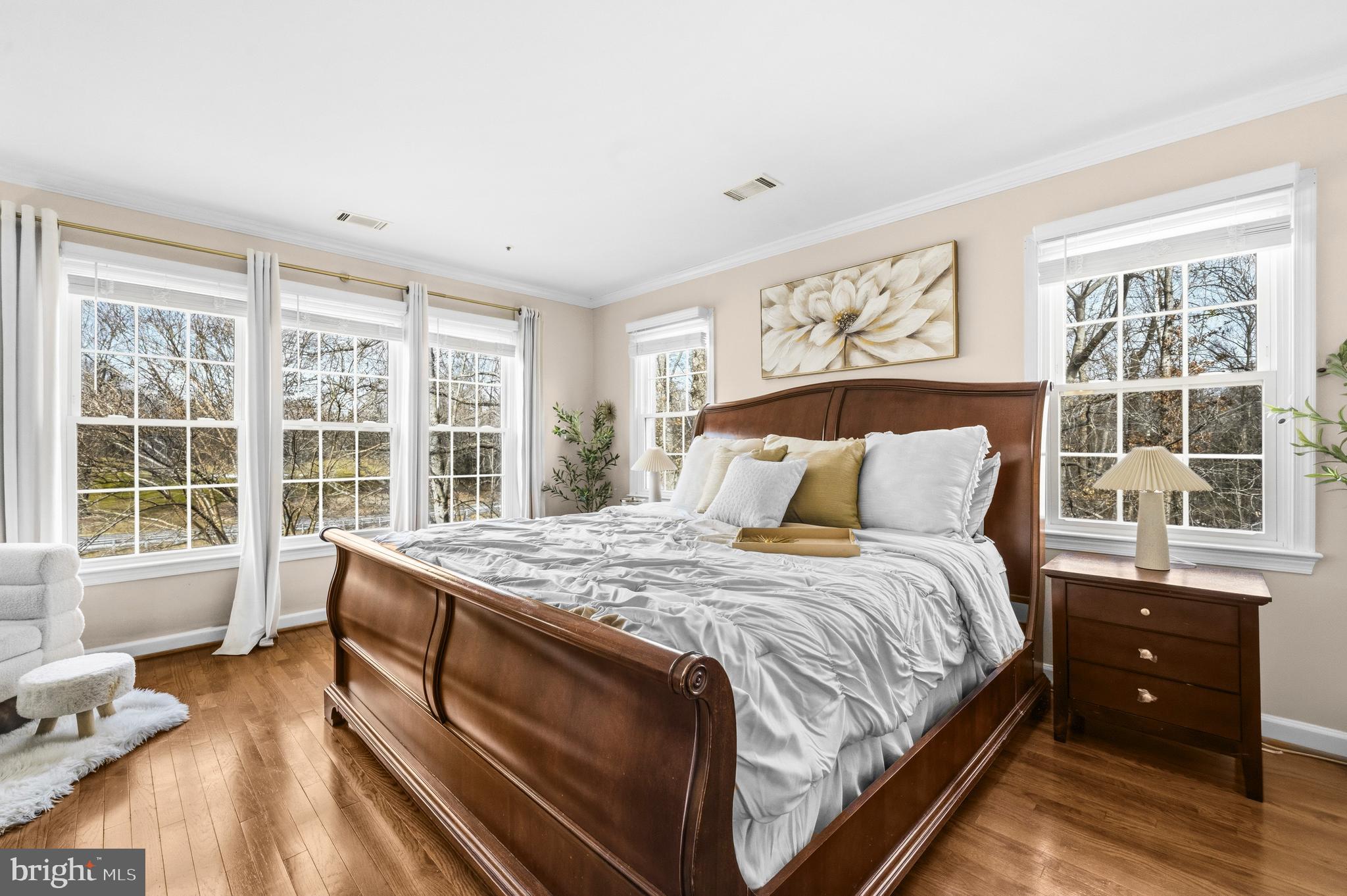 11806 Bishops Content Road Bowie, MD 20721 - Photo 19 of 49 a bedroom with a bed and wooden floor