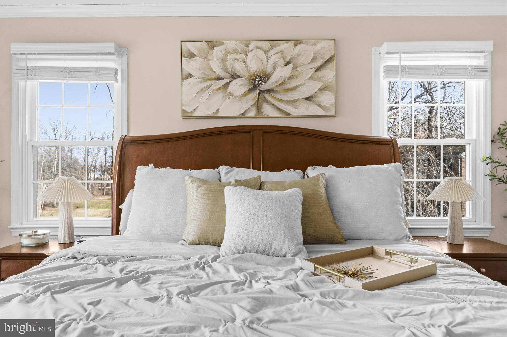 11806 Bishops Content Road Bowie, MD 20721 - Photo 21 of 49 a large bed sitting in a bedroom next to a window