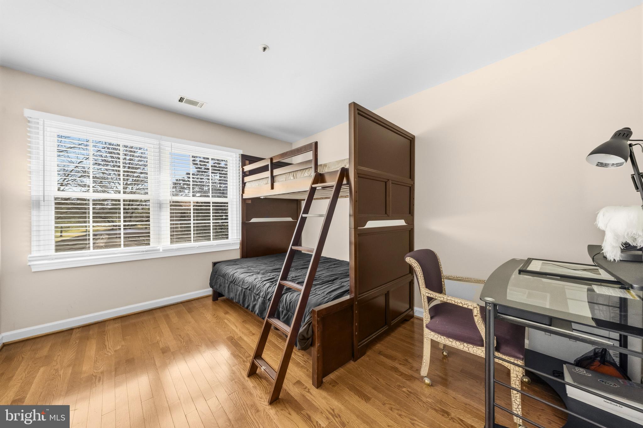 11806 Bishops Content Road Bowie, MD 20721 - Photo 26 of 49 a room with gym equipment and windows