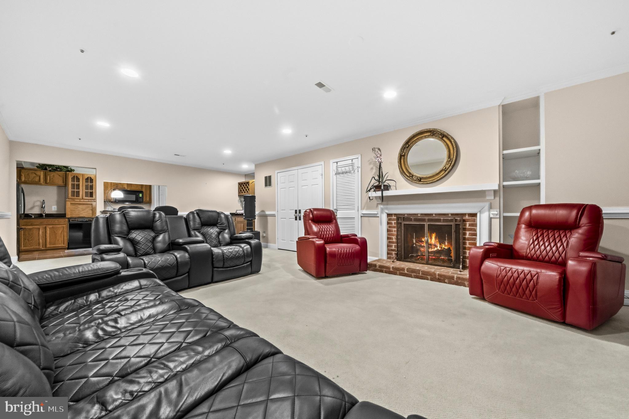 11806 Bishops Content Road Bowie, MD 20721 - Photo 30 of 49 a living room with furniture a fireplace and a large window
