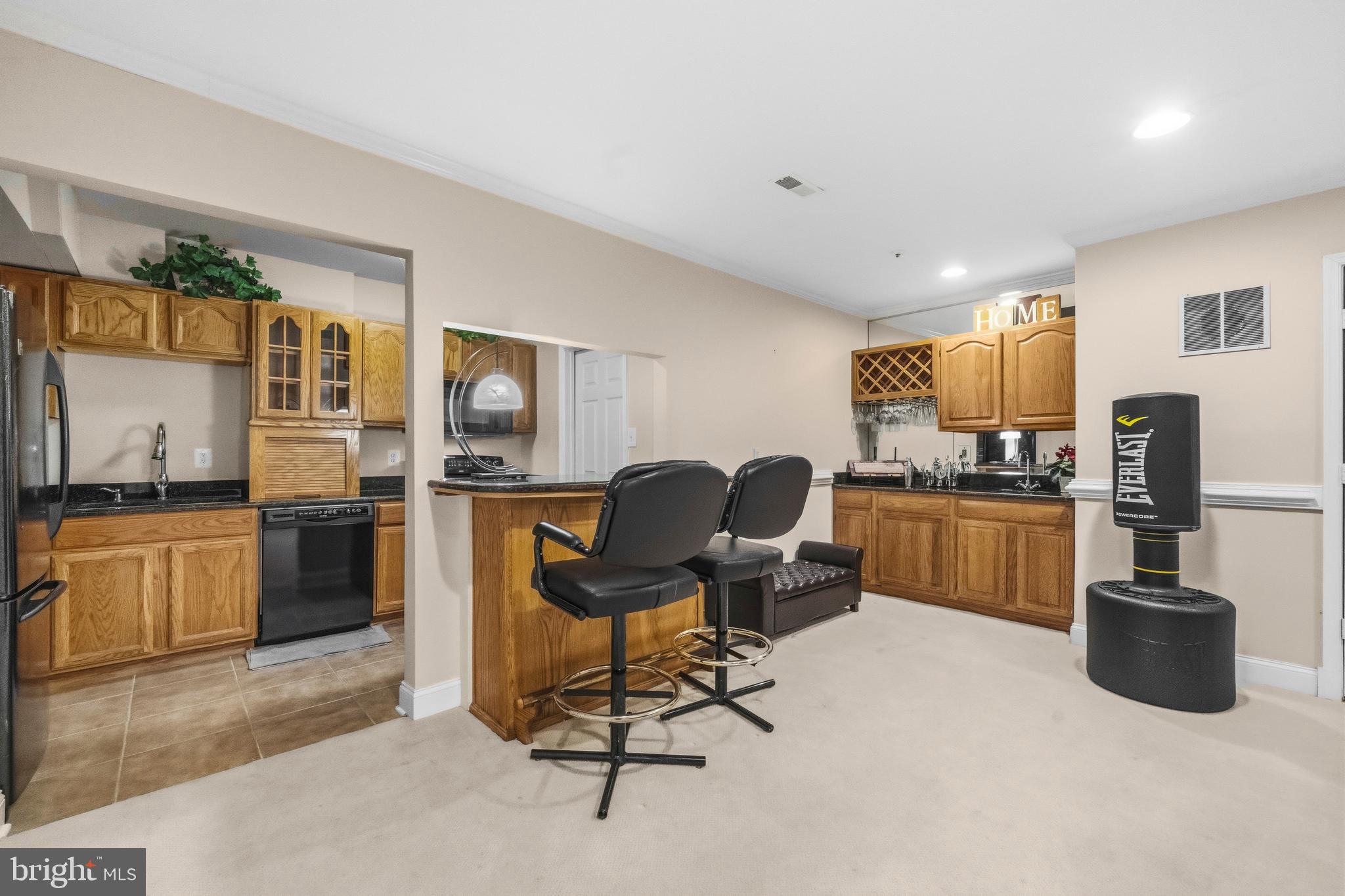 11806 Bishops Content Road Bowie, MD 20721 - Photo 31 of 49 a work place with a couch and a view of kitchen