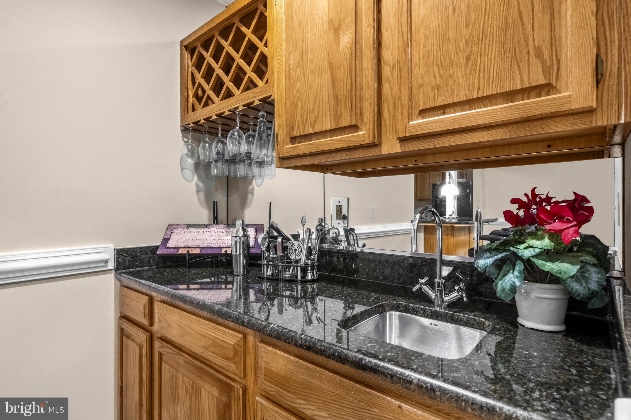 11806 Bishops Content Road Bowie, MD 20721 - Photo 32 of 49 a kitchen with a sink and cabinets