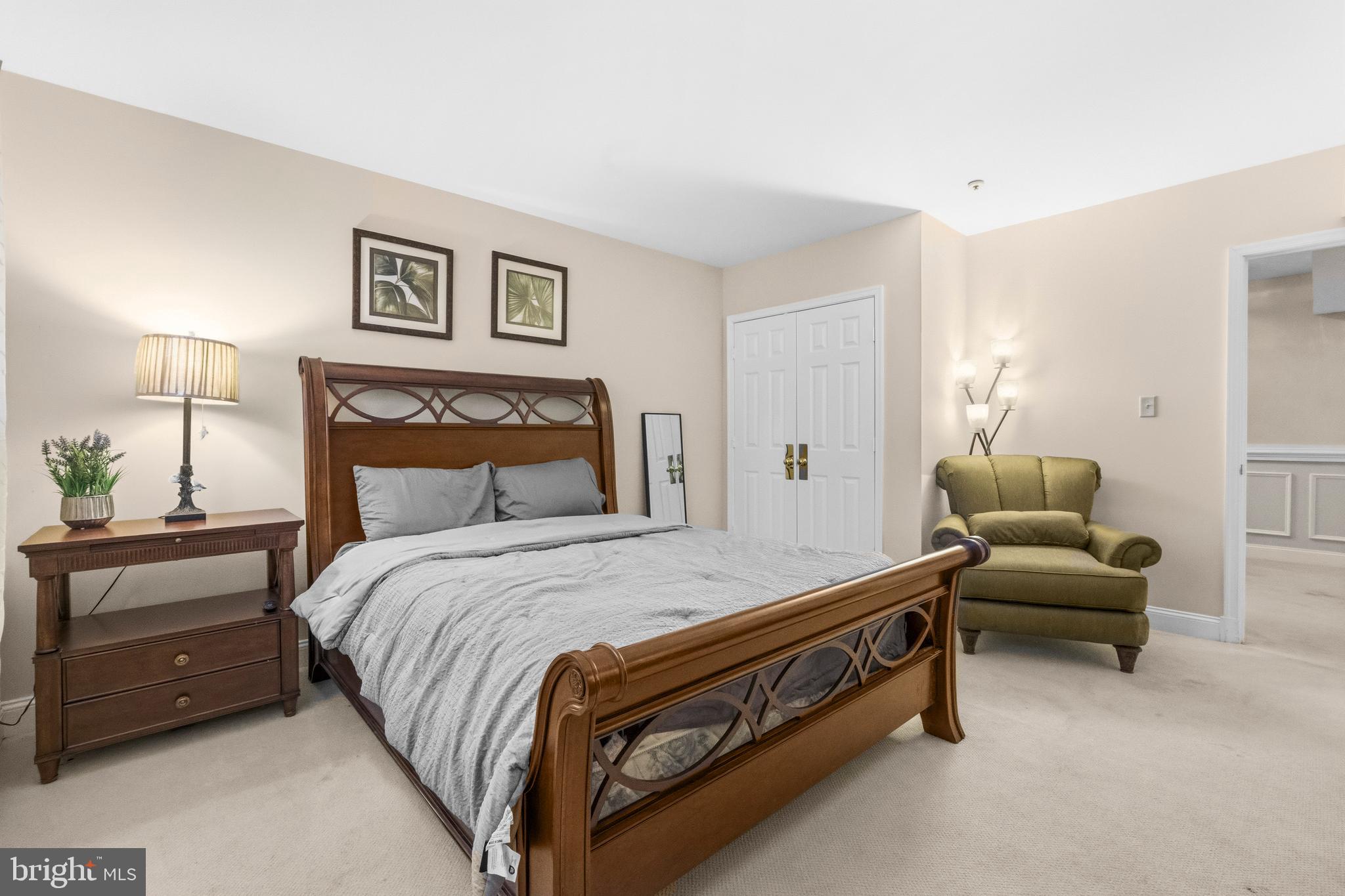 11806 Bishops Content Road Bowie, MD 20721 - Photo 34 of 49 a bedroom with a bed and furniture