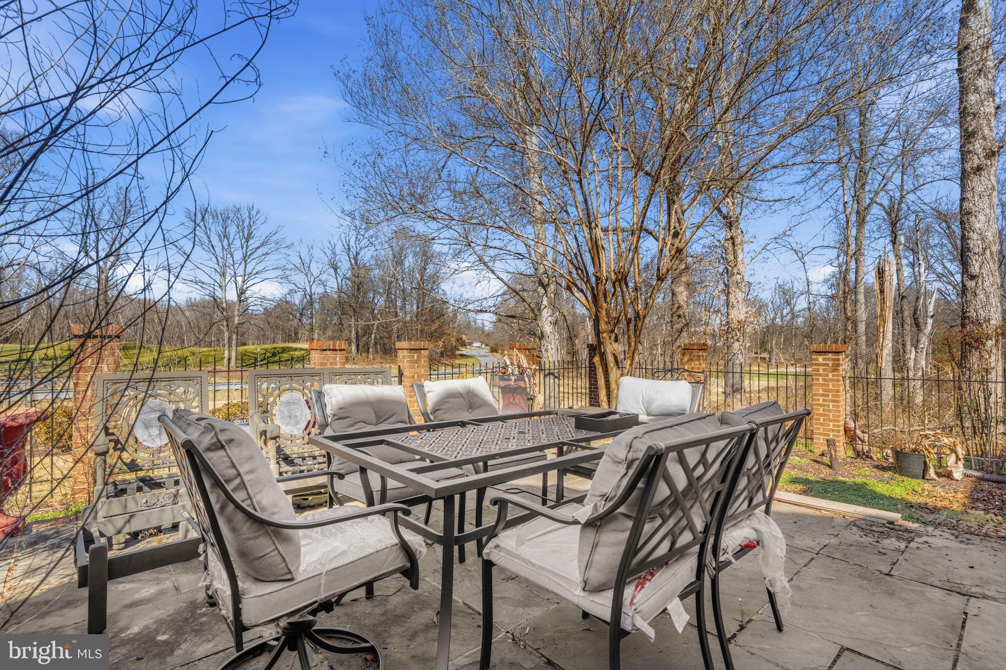 11806 Bishops Content Road Bowie, MD 20721 - Photo 38 of 49 a view of a patio with table and chairs