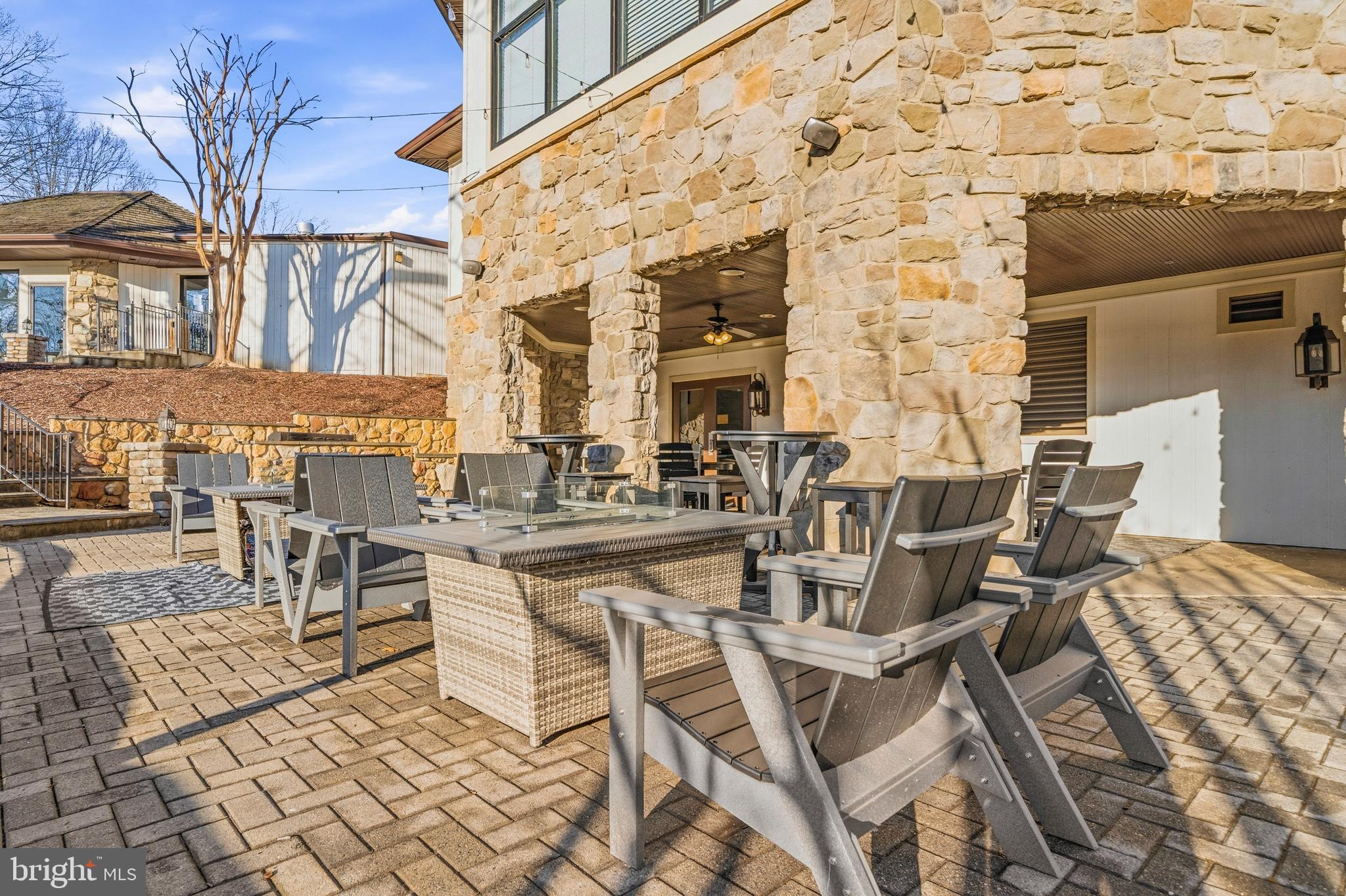 11806 Bishops Content Road Bowie, MD 20721 - Photo 46 of 49 a view of a patio with a table and chairs