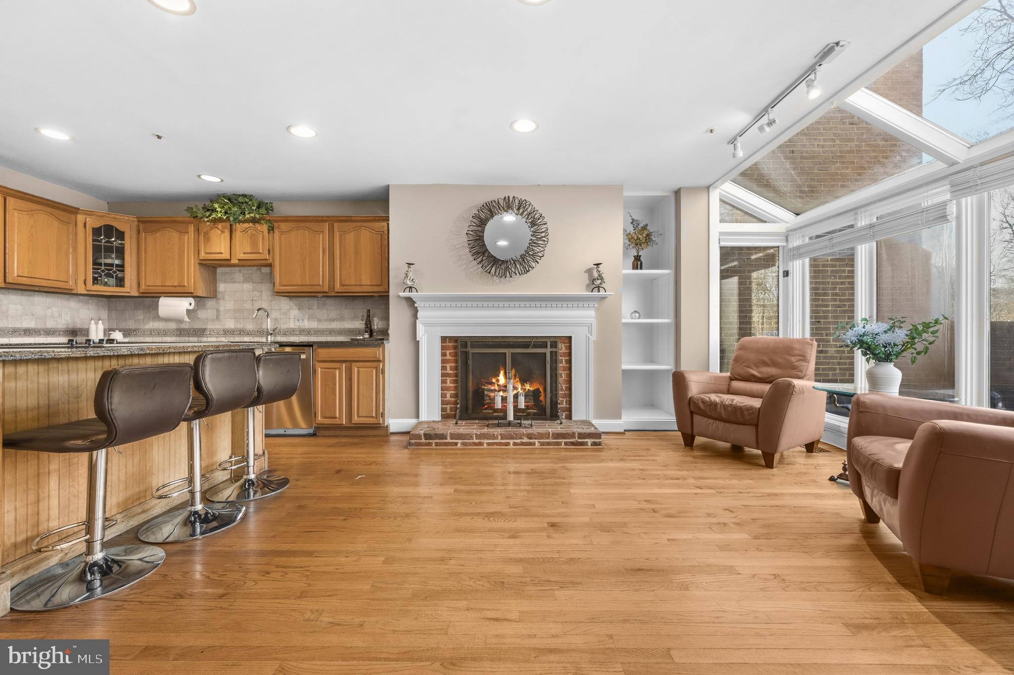 11806 Bishops Content Road Bowie, MD 20721 - Photo 9 of 49 a living room with furniture and a fireplace