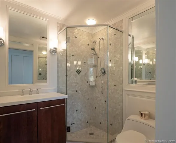 a picture of a book and a white bed