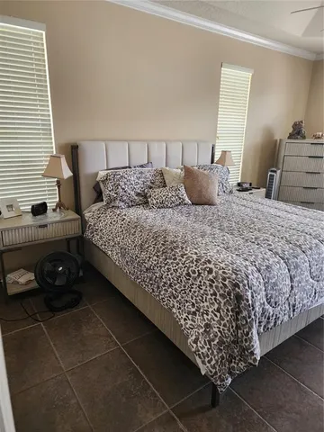 a bed room with a bed and a couch