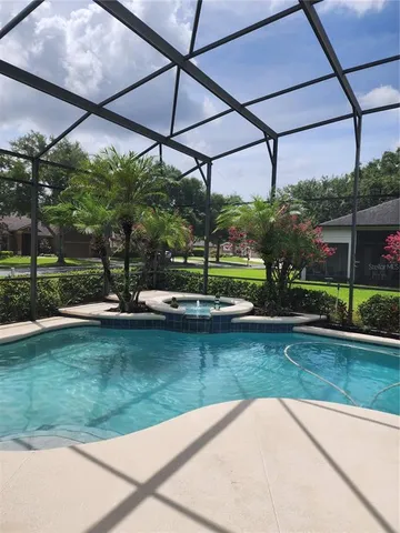 a view of a lake with a swimming pool
