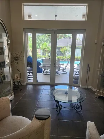 a living room with furniture and a table
