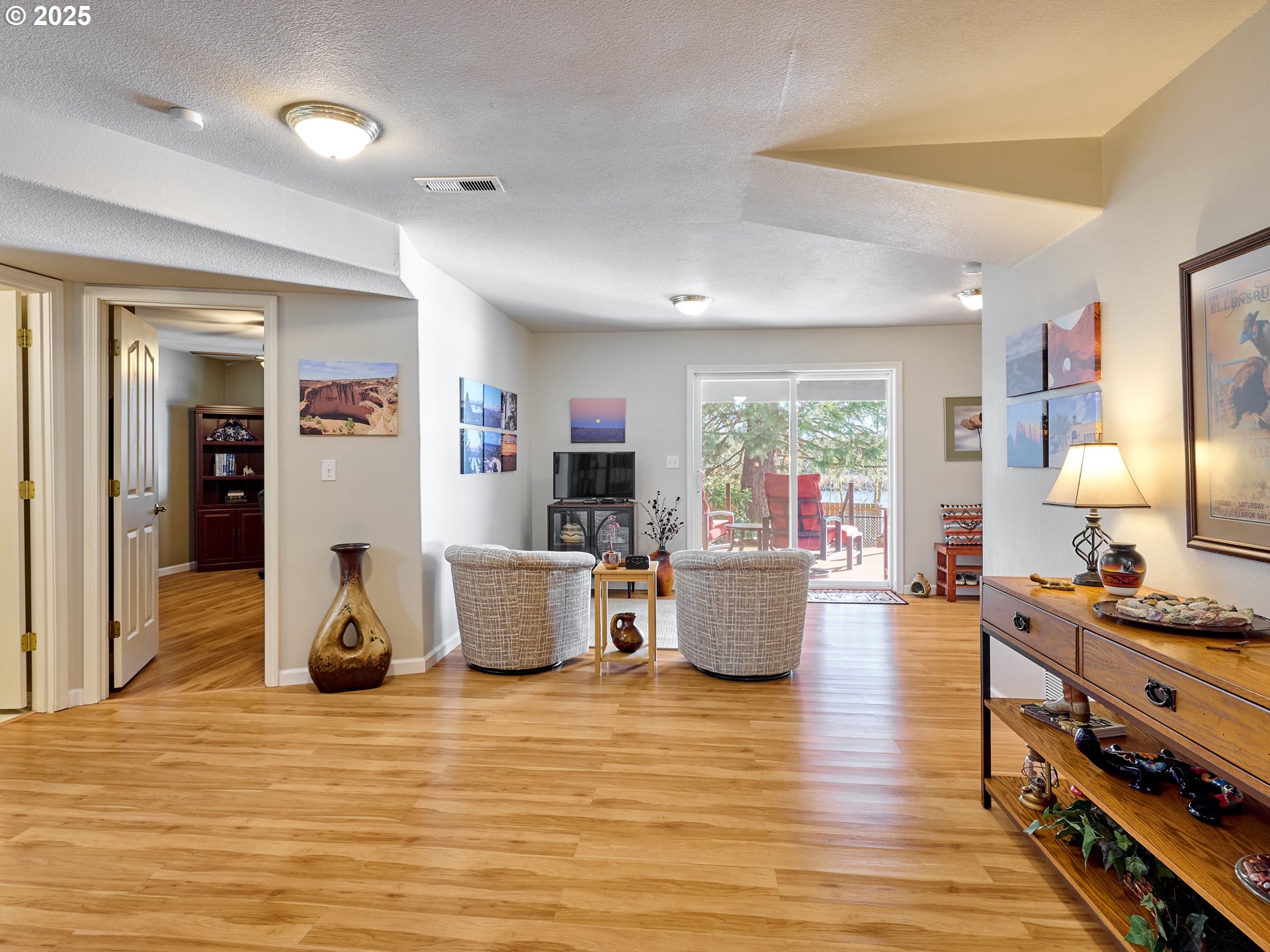 920 Hermanson Street Woodburn, OR 97071 - Photo 17 of 48 a living room with furniture and a wooden floor