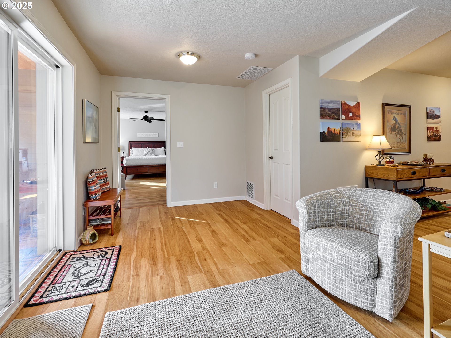 920 Hermanson Street Woodburn, OR 97071 - Photo 19 of 48 a bedroom with a bed and a couch